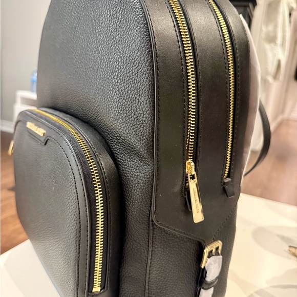 Black Leather Backpack with Gold Accents